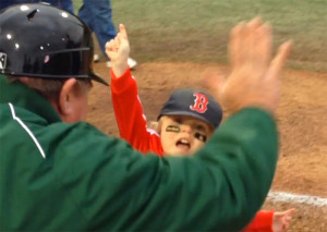 Cal, a former patient at Memorial Children’s Hospital, enjoys running the bases at a Silver Hawks game.
