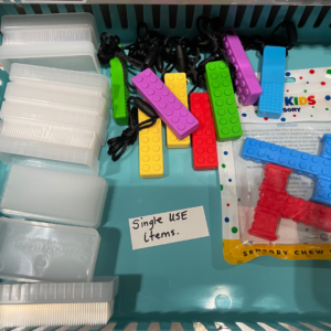 Sensory-support cart stocked with tools and resources for neurodivergent patients.